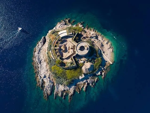 The round island fortress of Mamula seen from the air