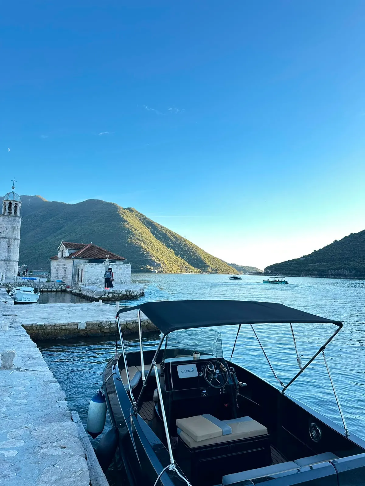 Guests on a private speedboat tour of the bay