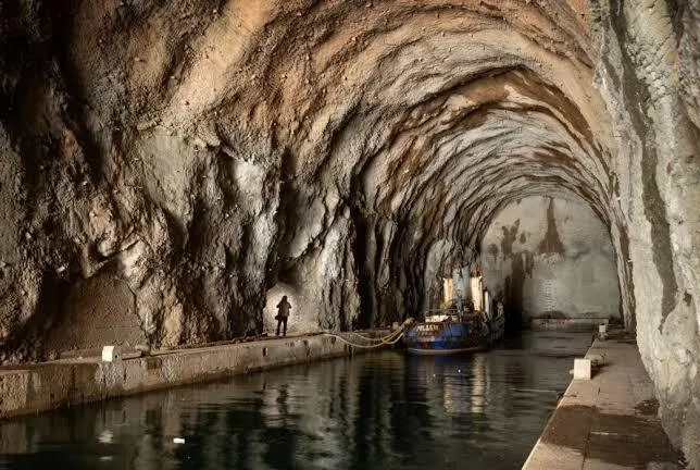 Inside the Cold-War submarine tunnel, entered by boat